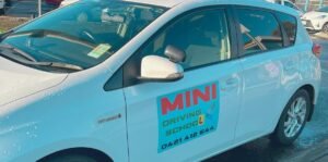 MINI Driving School car in Werribee with instructor signage
